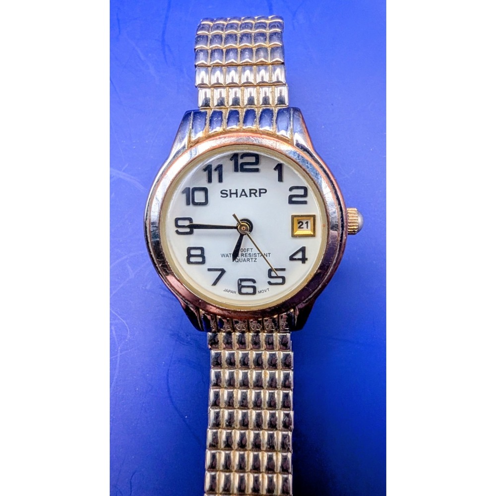 Sharp Ladies Watch Date Gold tone Stretch Band 5105 Vintage‎ New Batterry